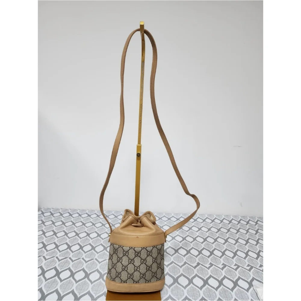 GUCCI Vintage Monogram Canvas Mini Drawstring Bucket Bag Brown/Beige